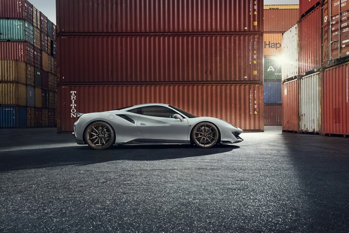 White Novitec 488 Pista Ferrari parked by shipping containers