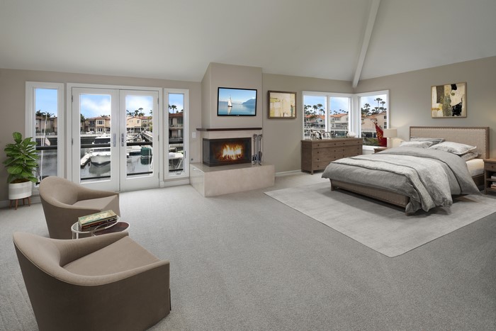 Bedroom with Fireplace and Canal View