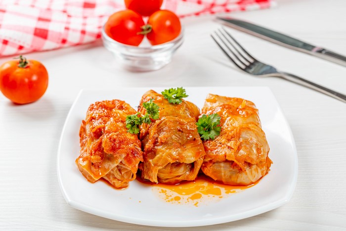 Cabbage rolls with tomatoes on a plate