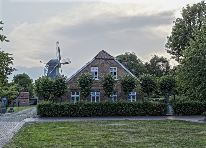 Brick house and windmill in Leezdorf, Germany