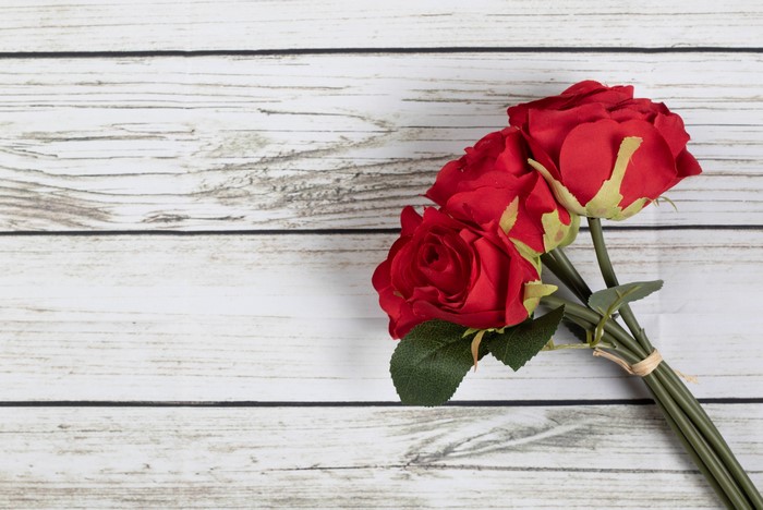Red Roses Bouquet on Wood Planks
