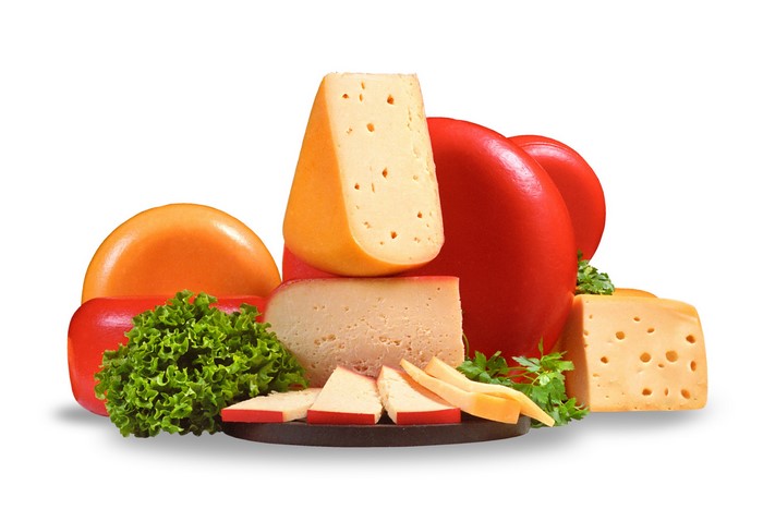 Assortment of cheeses with lettuce and parsley