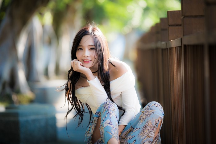 4K Portrait of Smiling Woman with Long Hair