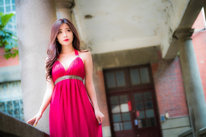 Asian woman in a red dress