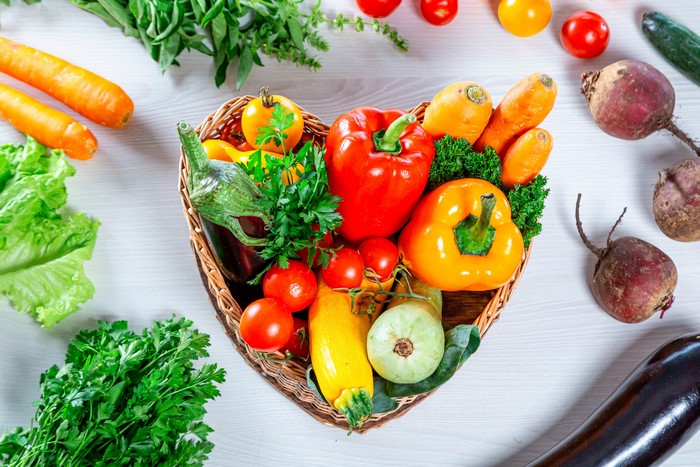 Heart-shaped basket of fresh vegetables