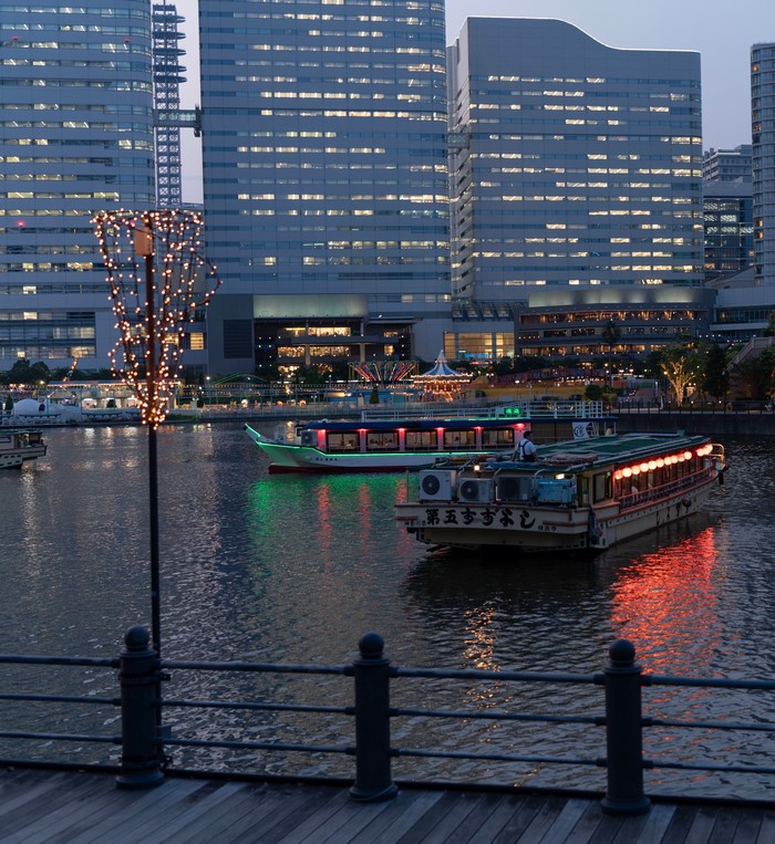 Yokohama Riverboats at Dusk with City Lights