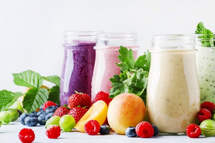 Four Jars of Smoothies with Fresh Fruits
