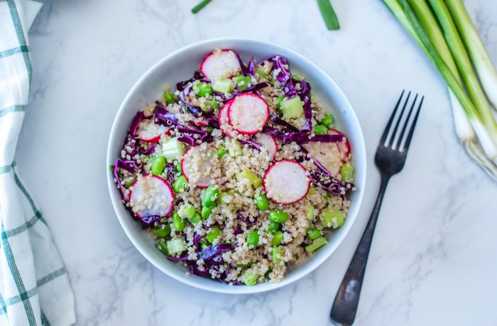 Quinoa salad with radishes, edamame, and red cabbage