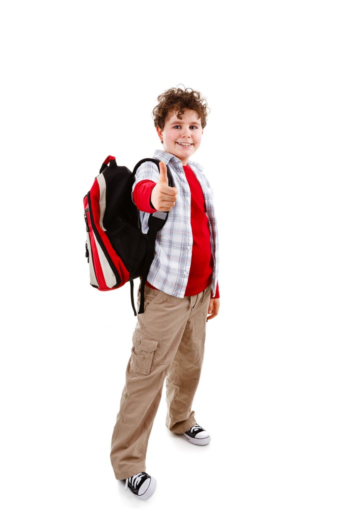 Boy with backpack giving thumbs up
