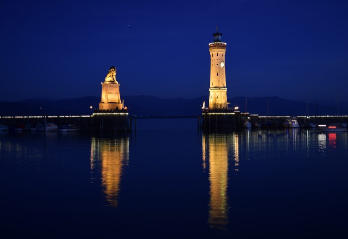 Lindau Lighthouse and Lion statue at night