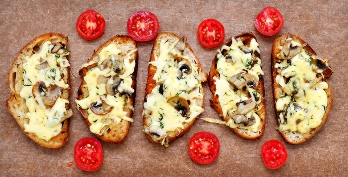 Mushroom and cheese bruschetta with cherry tomatoes
