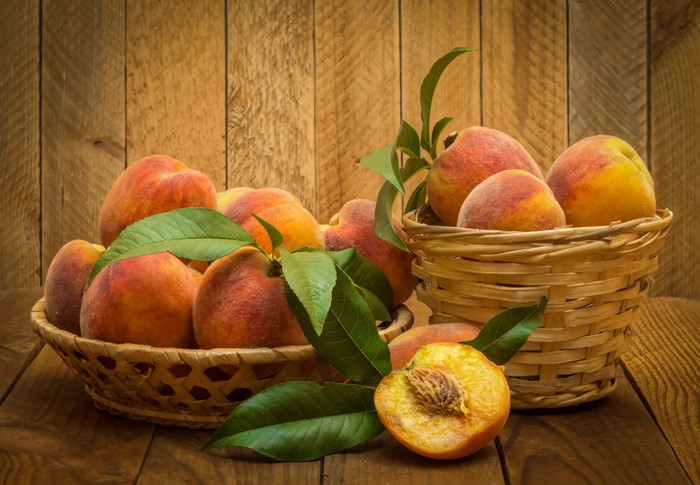 Peaches in Wicker Baskets