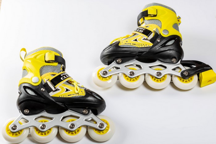 Pair of yellow and black roller skates