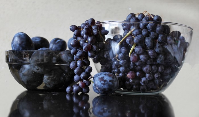 Grapes and Plums in Bowls
