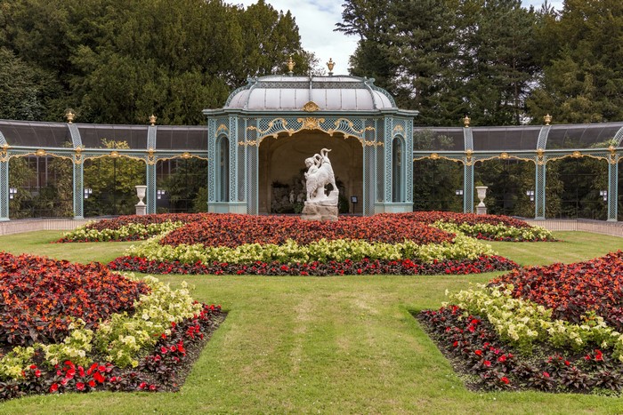 Waddesdon Manor garden with sculpture and flower beds