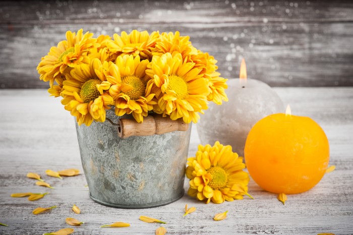 Yellow Chrysanthemums in a Bucket with Candles