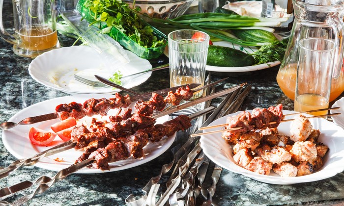 Shashlik and Juice on a Table