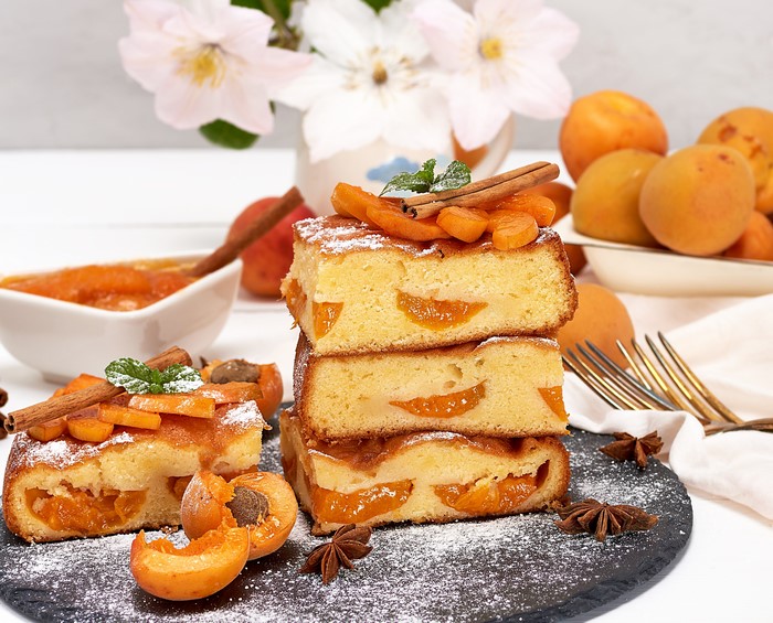Apricot pie slices with cinnamon and mint