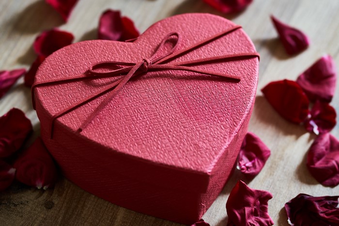 Red Heart-Shaped Gift Box with Rose Petals