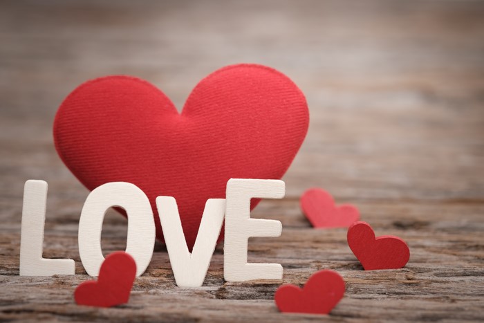 Love letters and hearts on wood