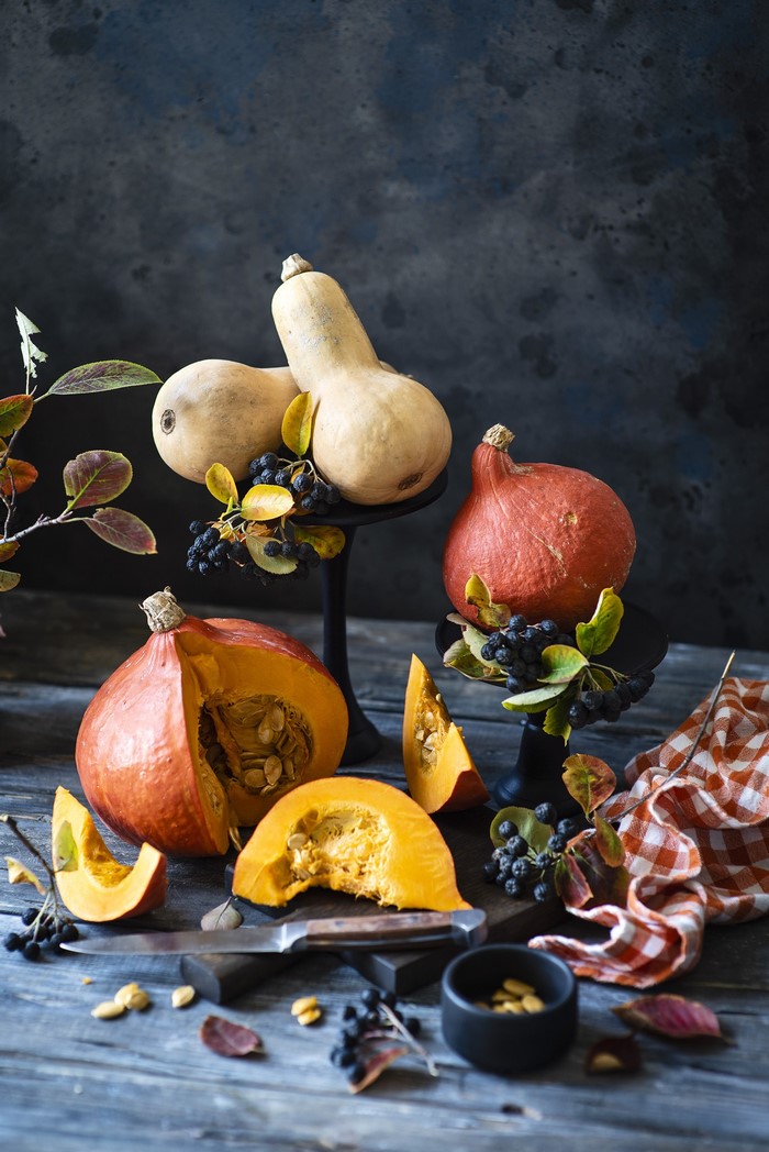 Still-life of pumpkins and berries