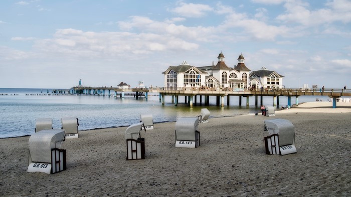 Beach with pier and buildings in Germany