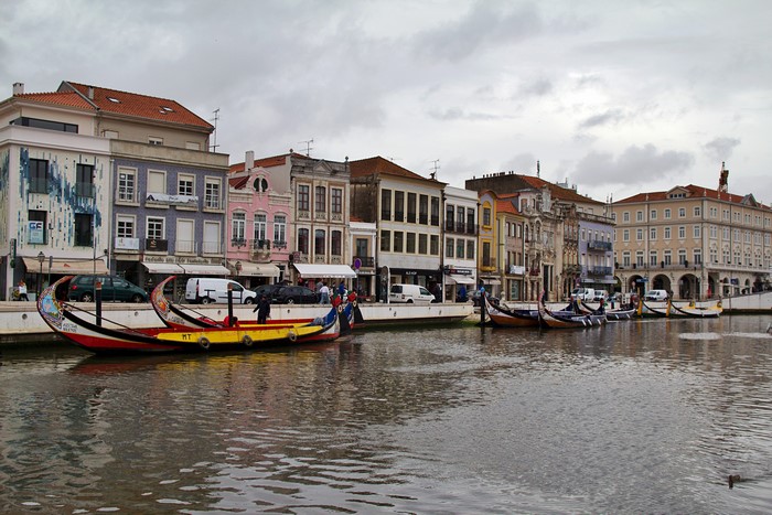 Moliceiro boats on a canal in Aveiro, Portugal