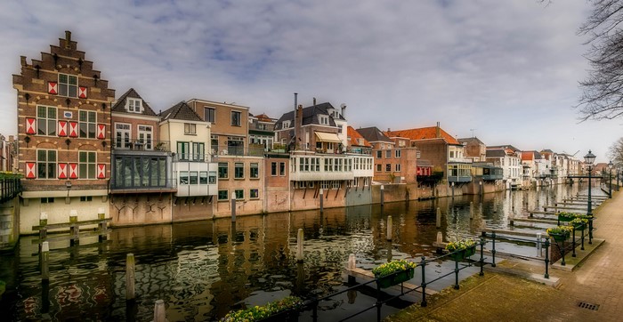 Gorinchem Netherlands canal with houses and street lights