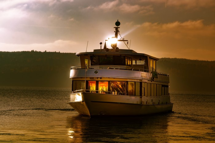 Riverboat on Lake Constance at sunset