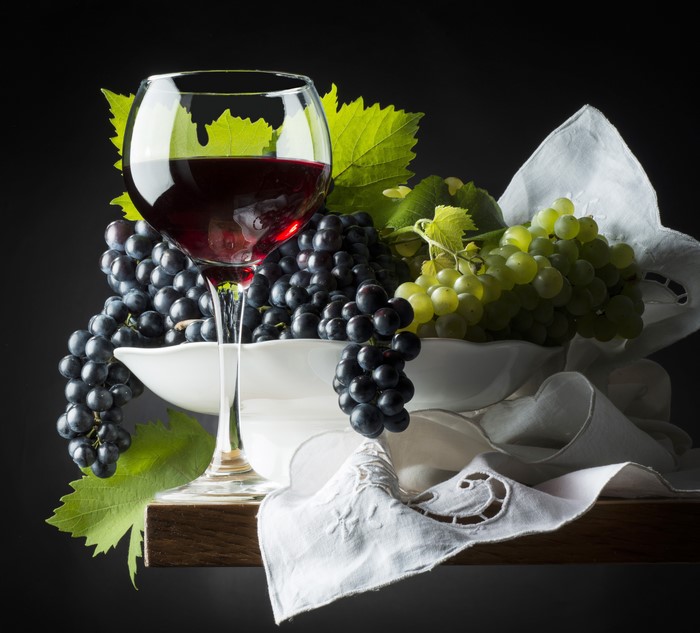 Red Wine in a Glass with Grapes