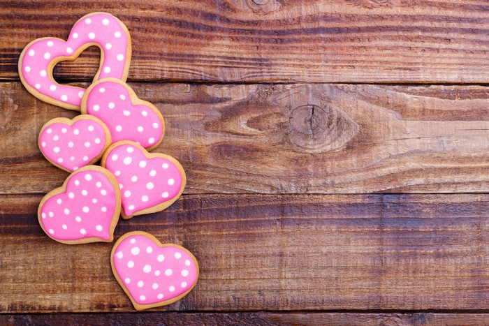 Pink Heart Cookies with White Polka Dots on Wood