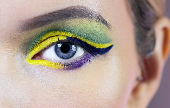 Closeup of eye with colorful makeup