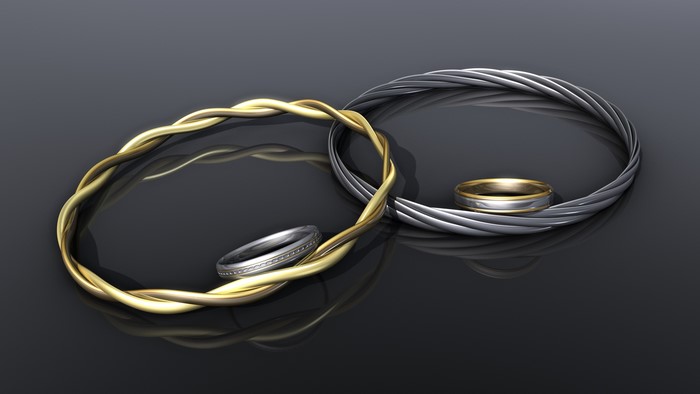 Gold and silver twisted bracelets with rings