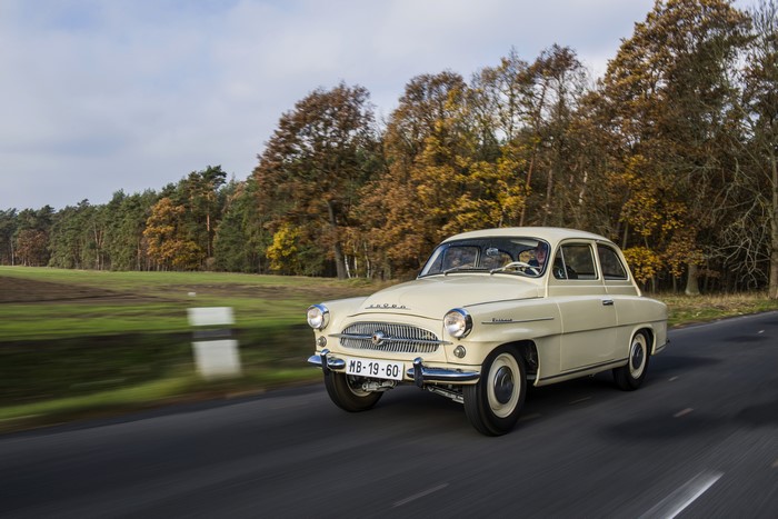 Škoda Octavia driving on a road in autumn