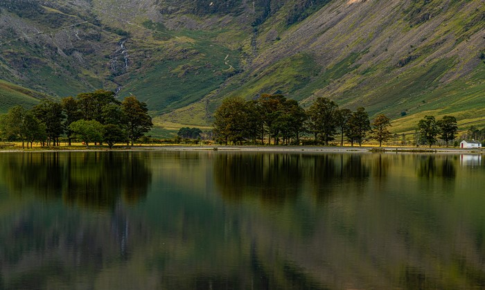 Lake with trees and mountains in England