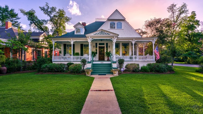 Victorian House with Porch and American Flag in Eufaula, Alabama