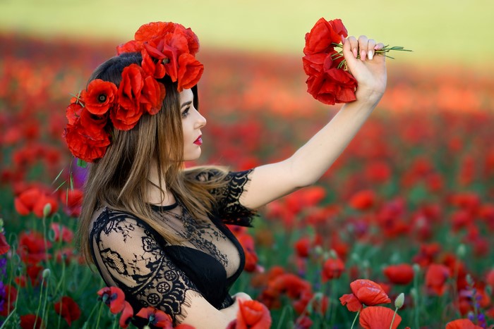 Woman with Poppy Wreath in Poppy Field