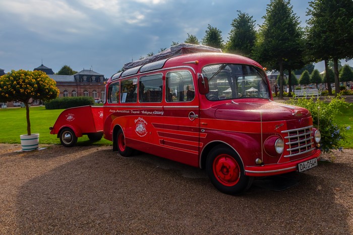 Red 1954 Fiat 615 N bus with trailer