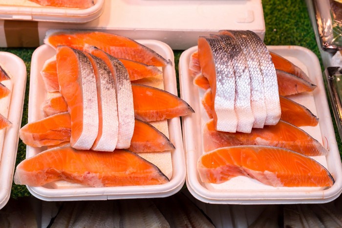 Slices of Raw Salmon on Trays