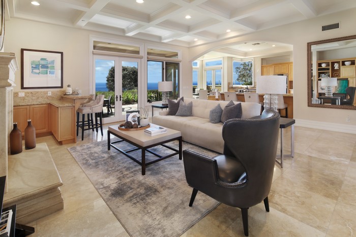 Living room with ocean view and bar