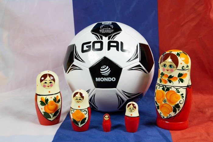 Soccer ball and Matryoshka dolls on French flag
