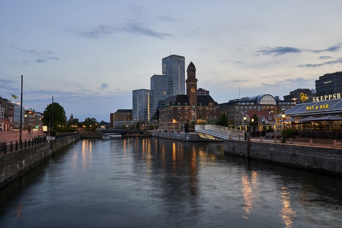 Malmö city skyline with canal at dusk