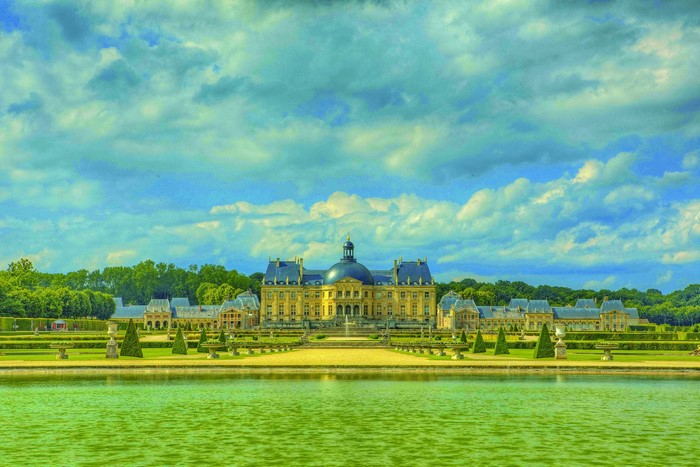 Chateau de Vaux-le-Vicomte with gardens and water in France