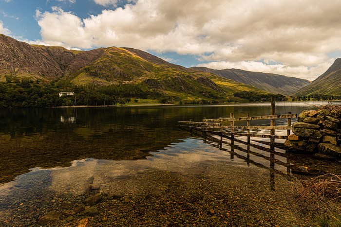 Buttermere Lake with Mountains and Wooden Jetty, England