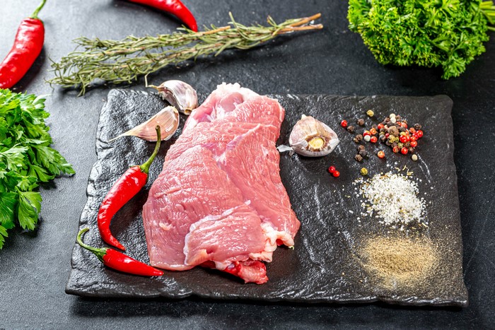 Raw Meat with Chili Peppers, Garlic, and Spices