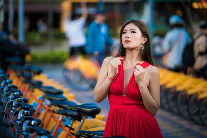 4K Portrait of Woman in Red Dress With Bokeh