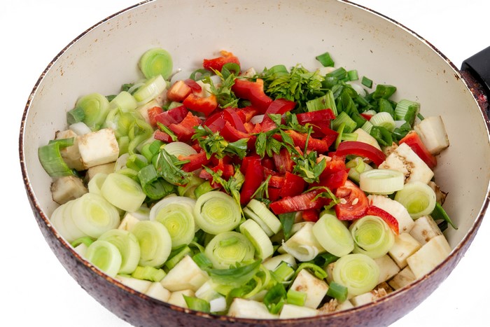 4K Vegetables Sliced in Frying Pan