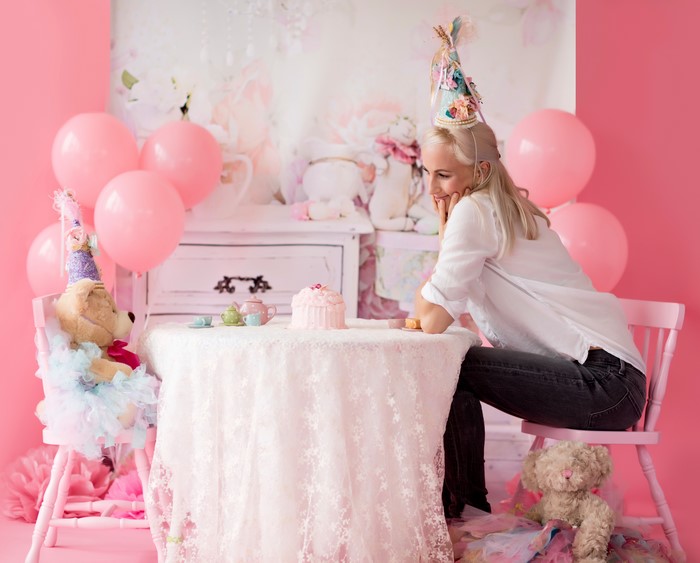 Birthday party with teddy bear and balloons