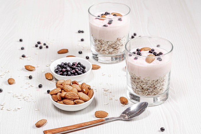 Yogurt parfaits with muesli, berries, and almonds