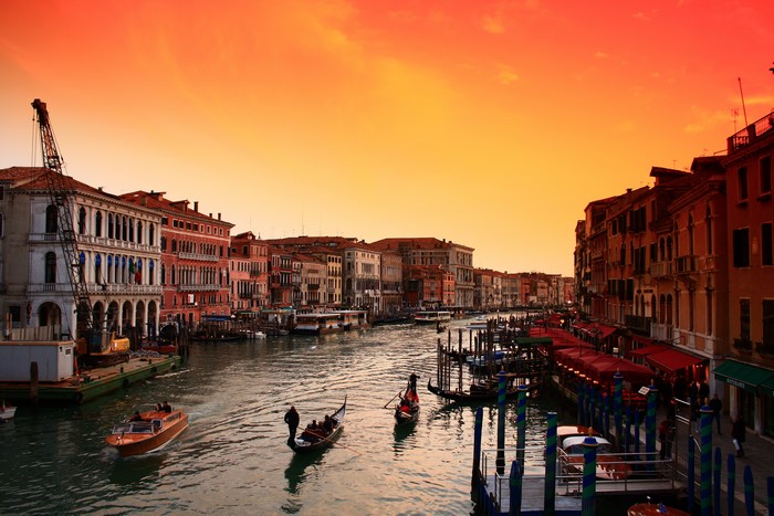 Venice Canal at Sunset with Gondolas and Boats